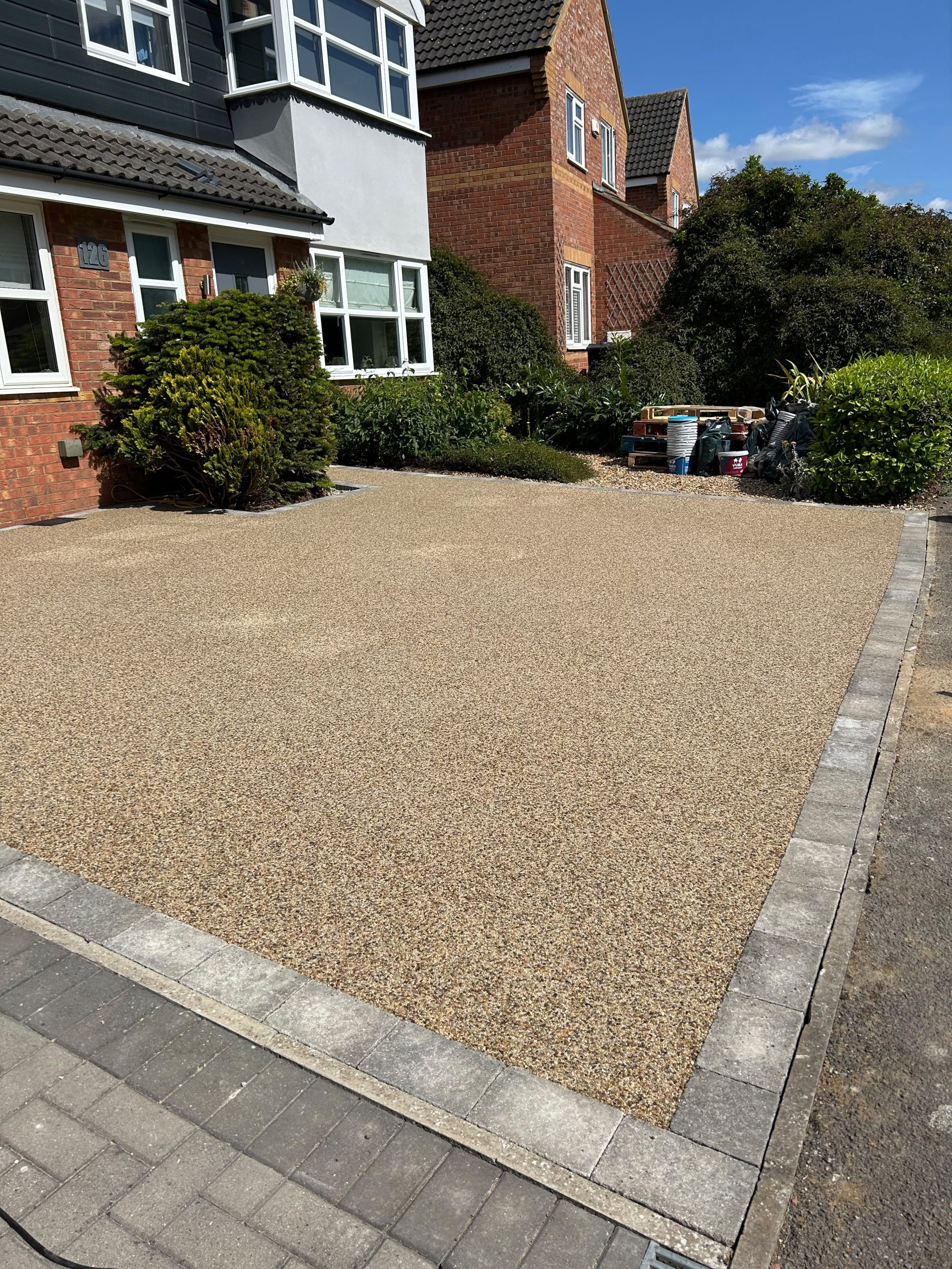 Resin driveway leading up to house